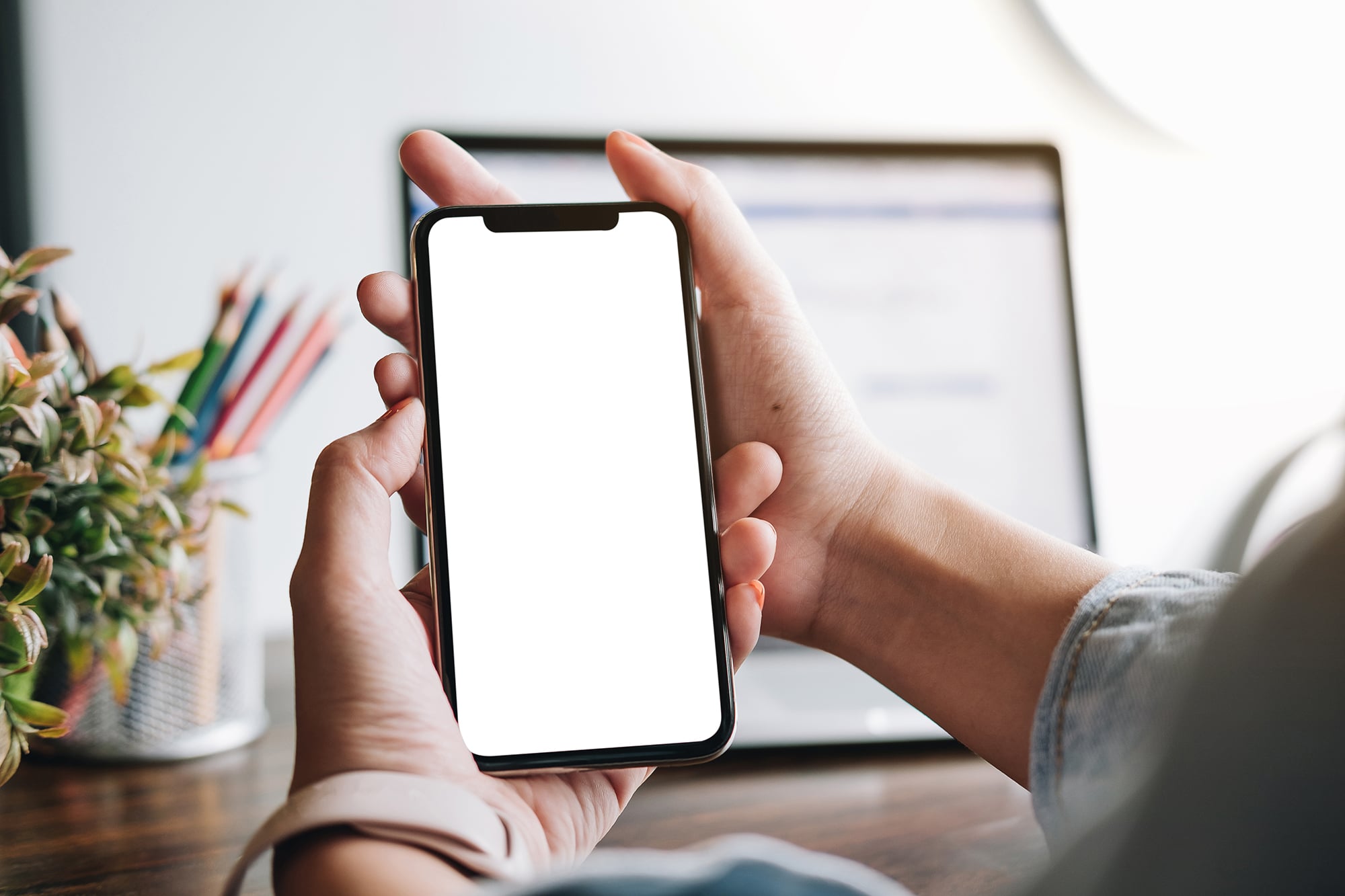 woman using Smartphone. Blank screen mobile phone for graphic di